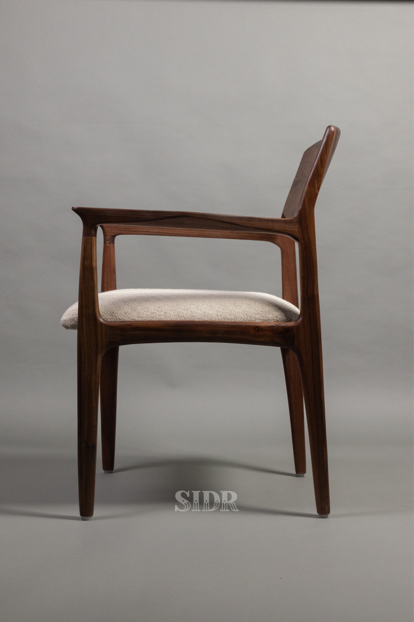 The Walnut Aanand Dining Chair with Wooden Back