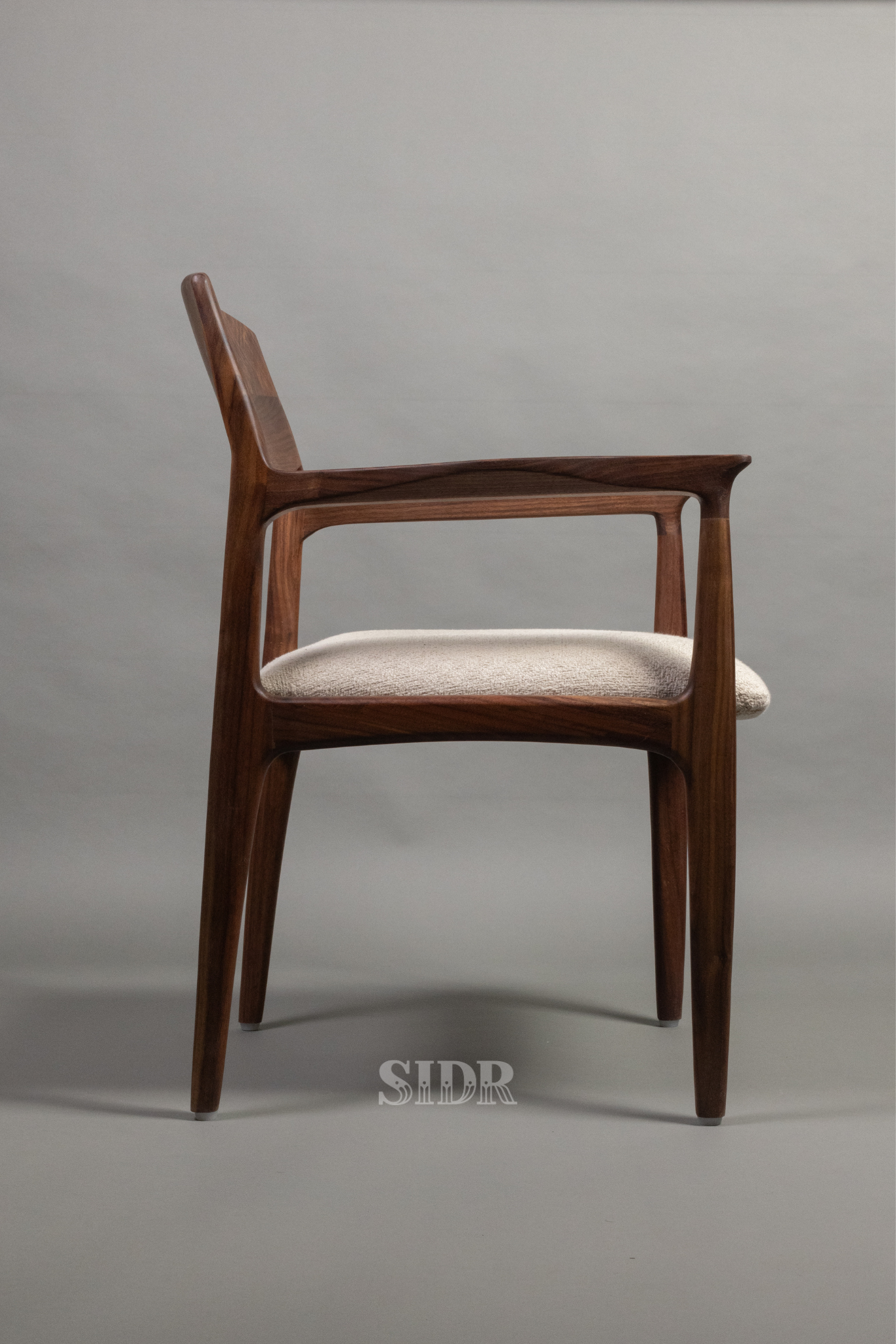 The Walnut Aanand Dining Chair with Wooden Back